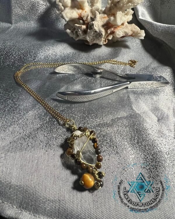 Bolivian cystalline quartz with brass tiger eye frames and Surgical steel chain unisex design - Image 3